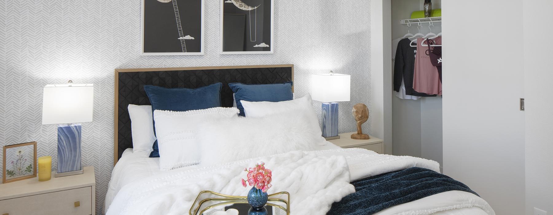 a bed with a white bed spread